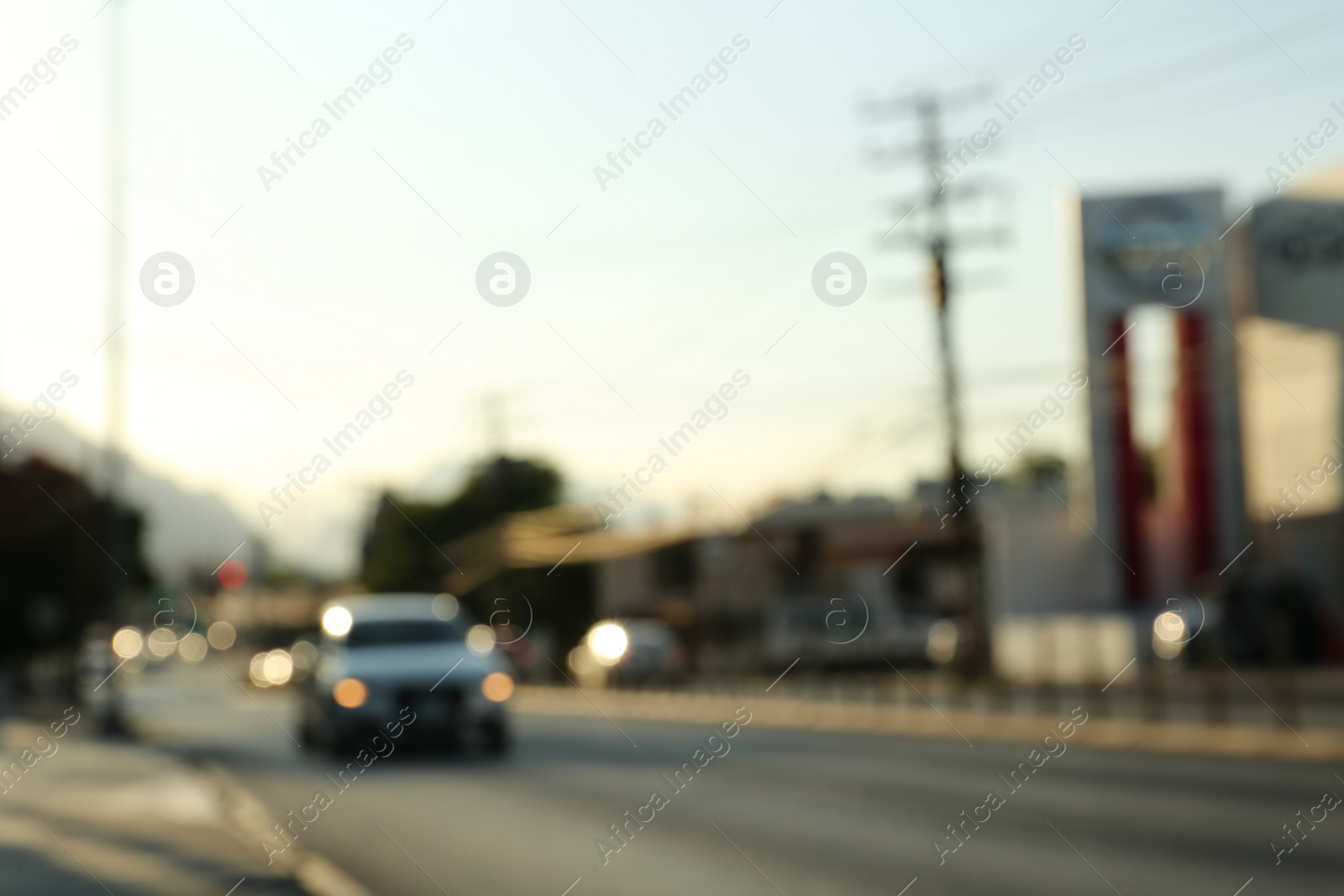 Photo of Blurred view of road with cars, bokeh effect