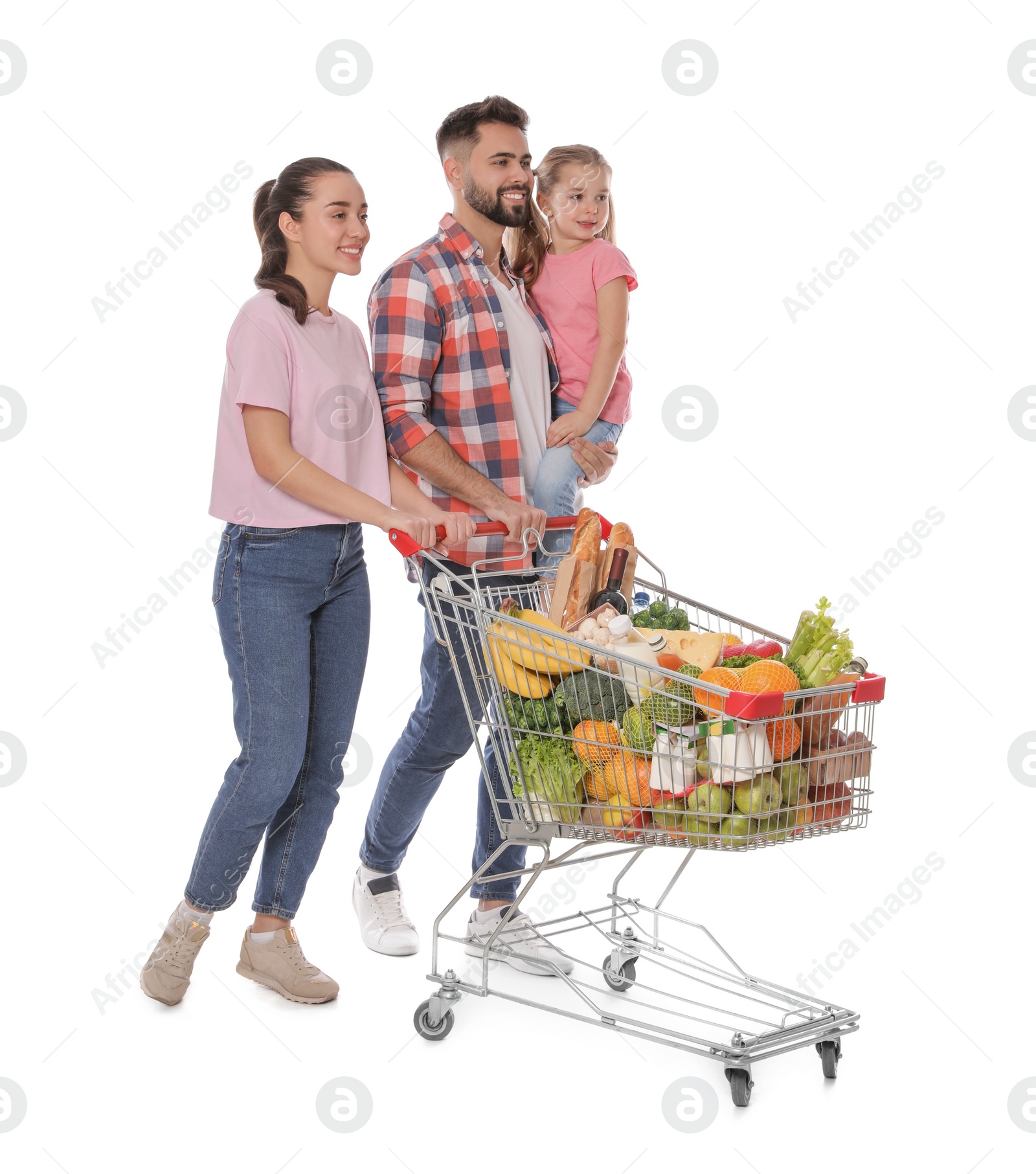 Photo of Happy family with shopping cart full of groceries on white background