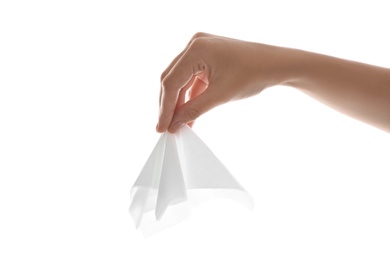 Photo of Woman holding paper tissue on white background, closeup