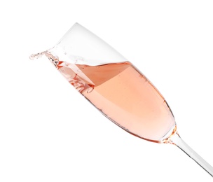 Photo of Glass of rose champagne isolated on white