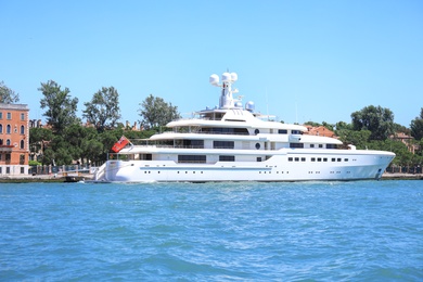 Photo of VENICE, ITALY - JUNE 13, 2019: Modern motor ship moored near shore