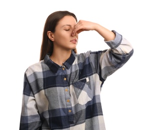 Photo of Young woman suffering from runny nose on white background