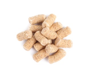 Photo of Pile of granulated wheat bran on white background, top view