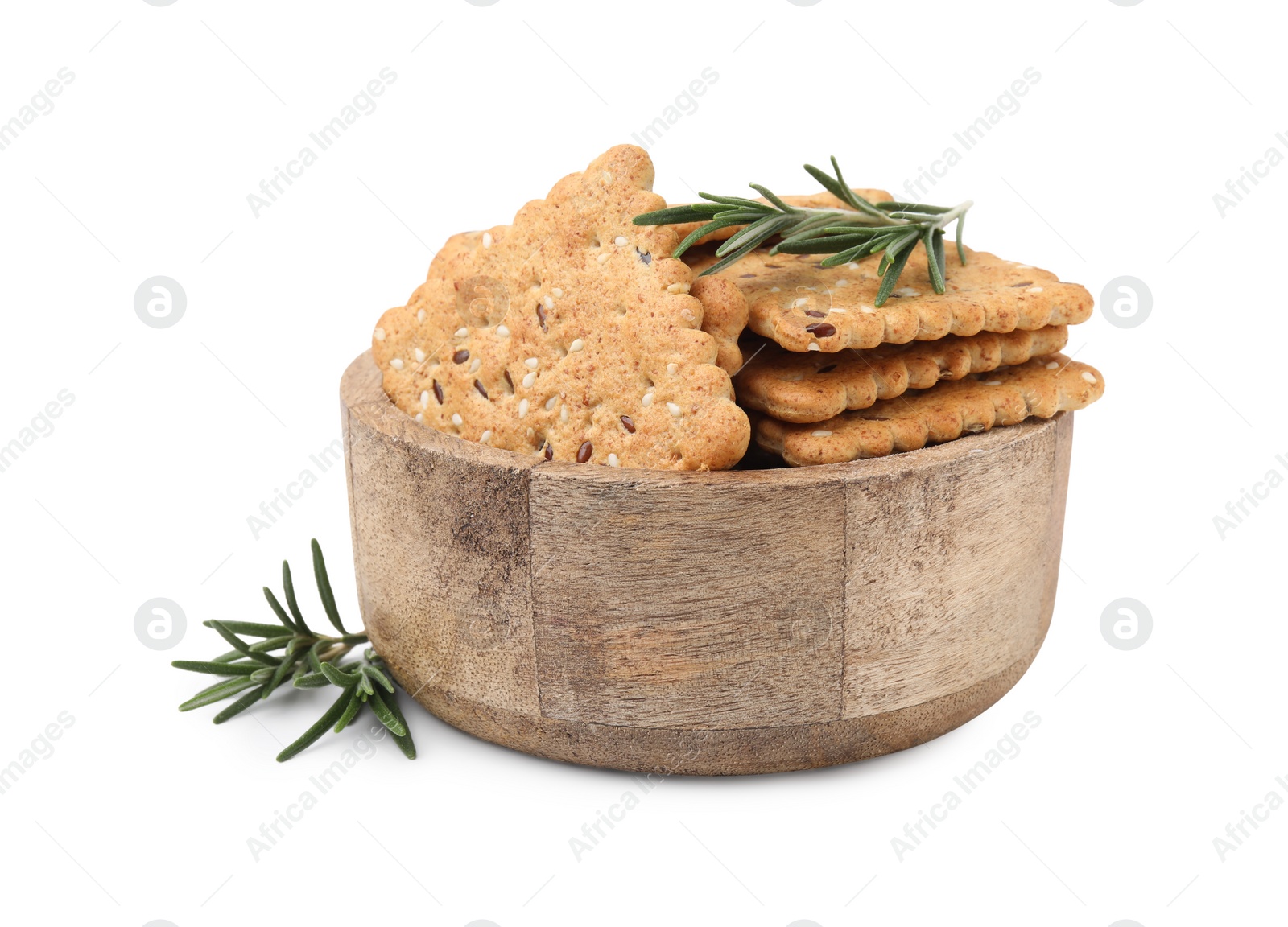 Photo of Cereal crackers with flax, sesame seeds and rosemary in bowl isolated on white