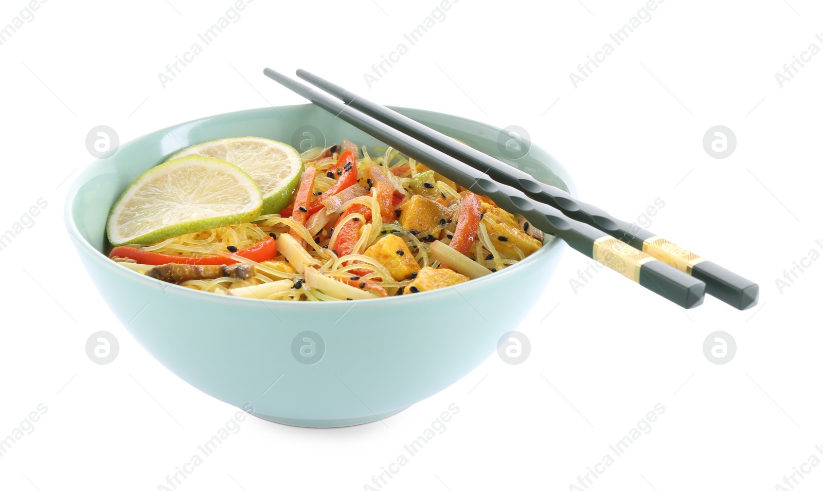 Photo of Stir-fry. Delicious cooked noodles with chicken and vegetables in bowl isolated on white