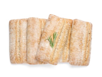 Photo of Crispy ciabattas with rosemary isolated on white, top view. Fresh bread