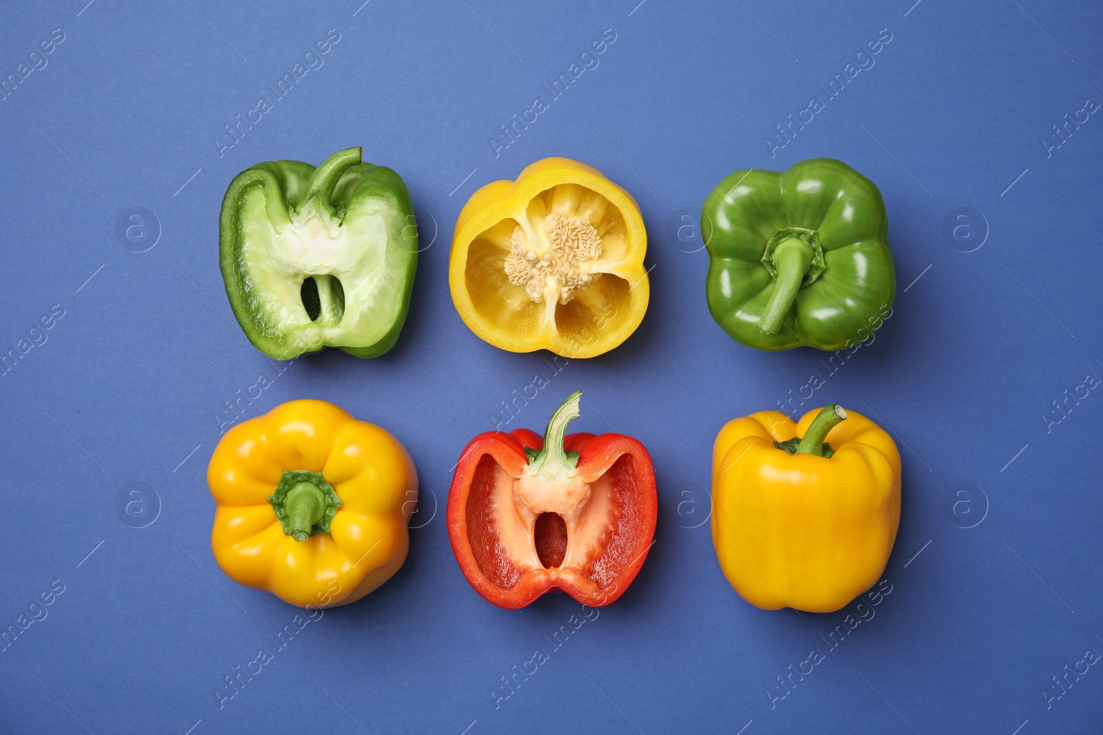 Photo of Flat lay composition with raw ripe paprika peppers on color background