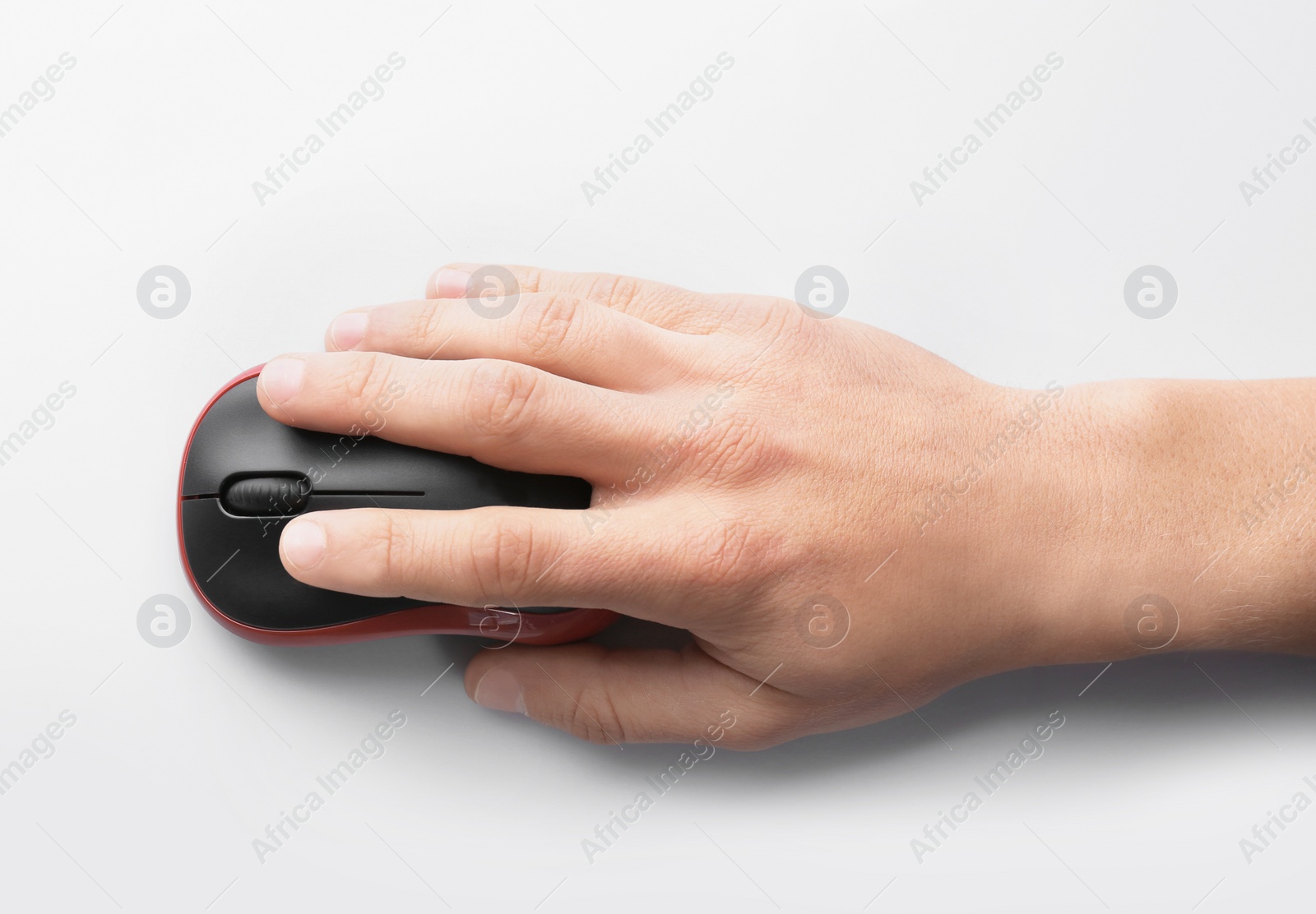 Photo of Man using computer mouse on white background, top view