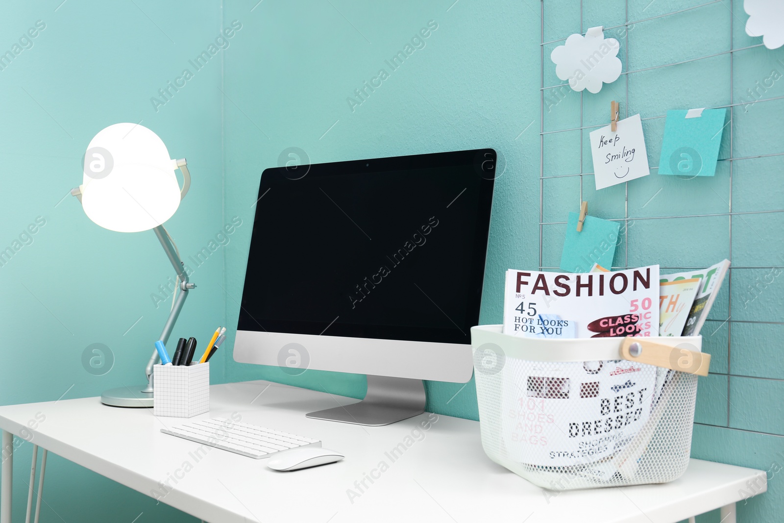Photo of Comfortable workplace with computer on desk in home office