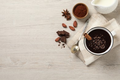 Photo of Flat lay composition with yummy hot chocolate on white wooden table. Space for text