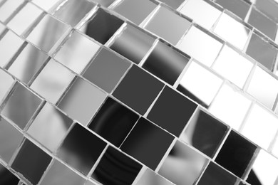 Photo of Bright shiny disco ball as background, closeup