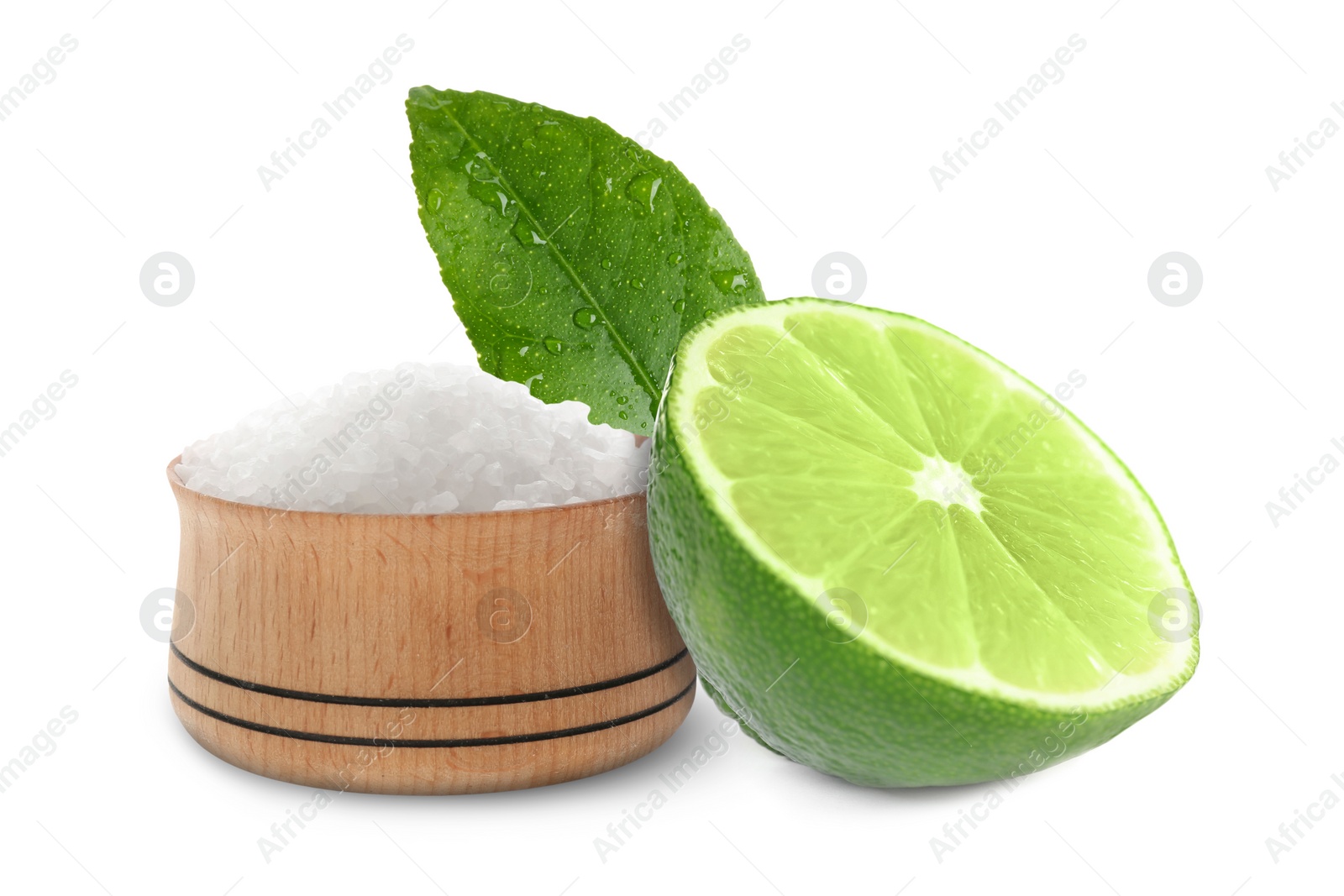 Image of Cut lime and salt isolated on white. Margarita cocktail ingredients