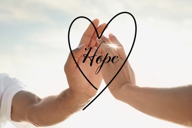 Concept of hope. Man and woman reaching hands to each other, closeup