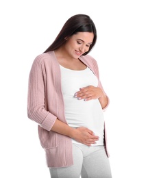 Beautiful pregnant young woman on white background