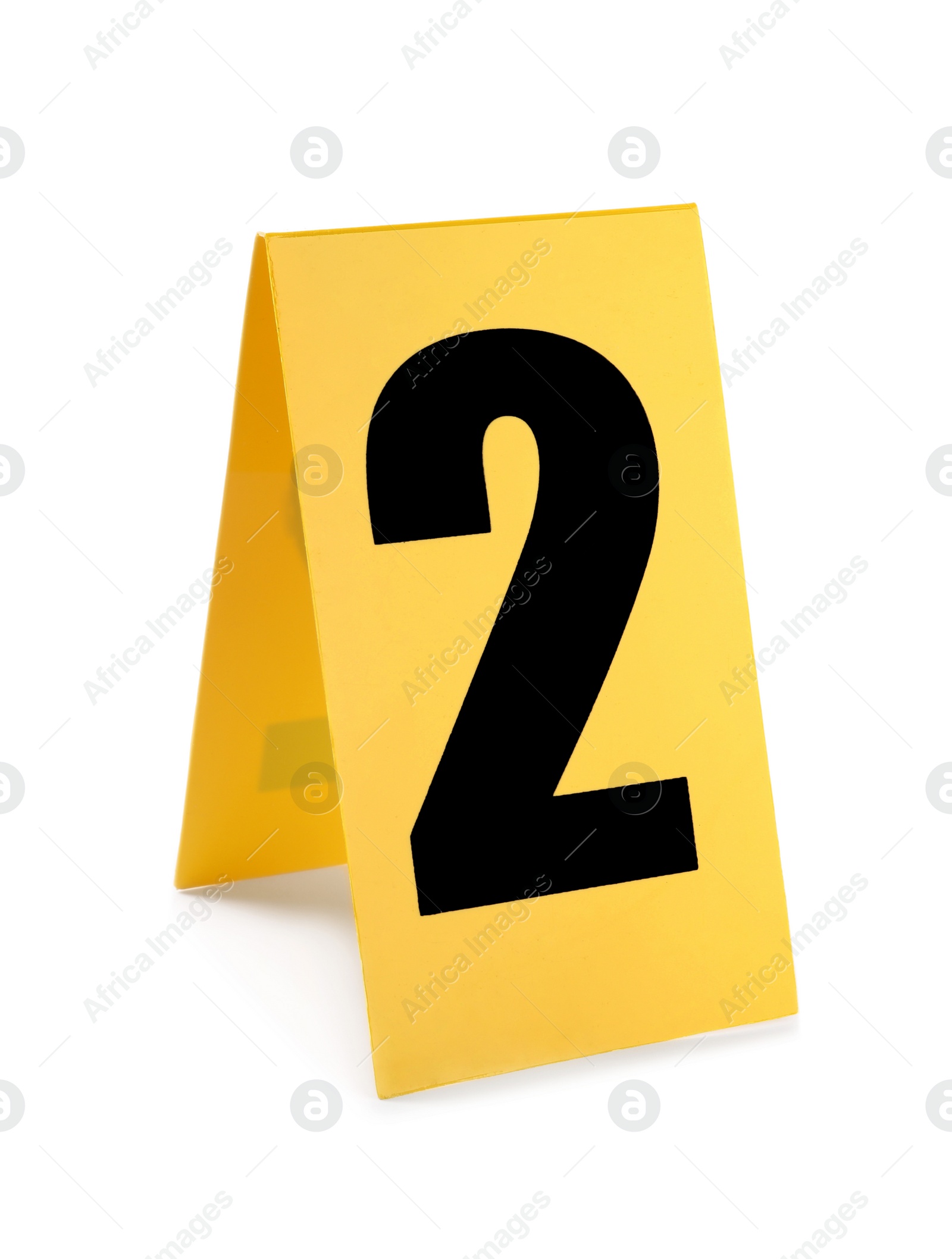 Photo of Yellow crime scene marker with number two on white background