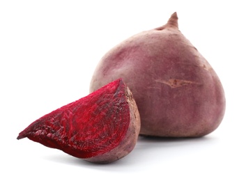 Photo of Cut and whole beets on white background. Taproot vegetable