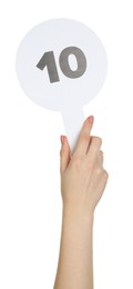 Photo of Woman holding auction paddle with number 10 on white background, closeup