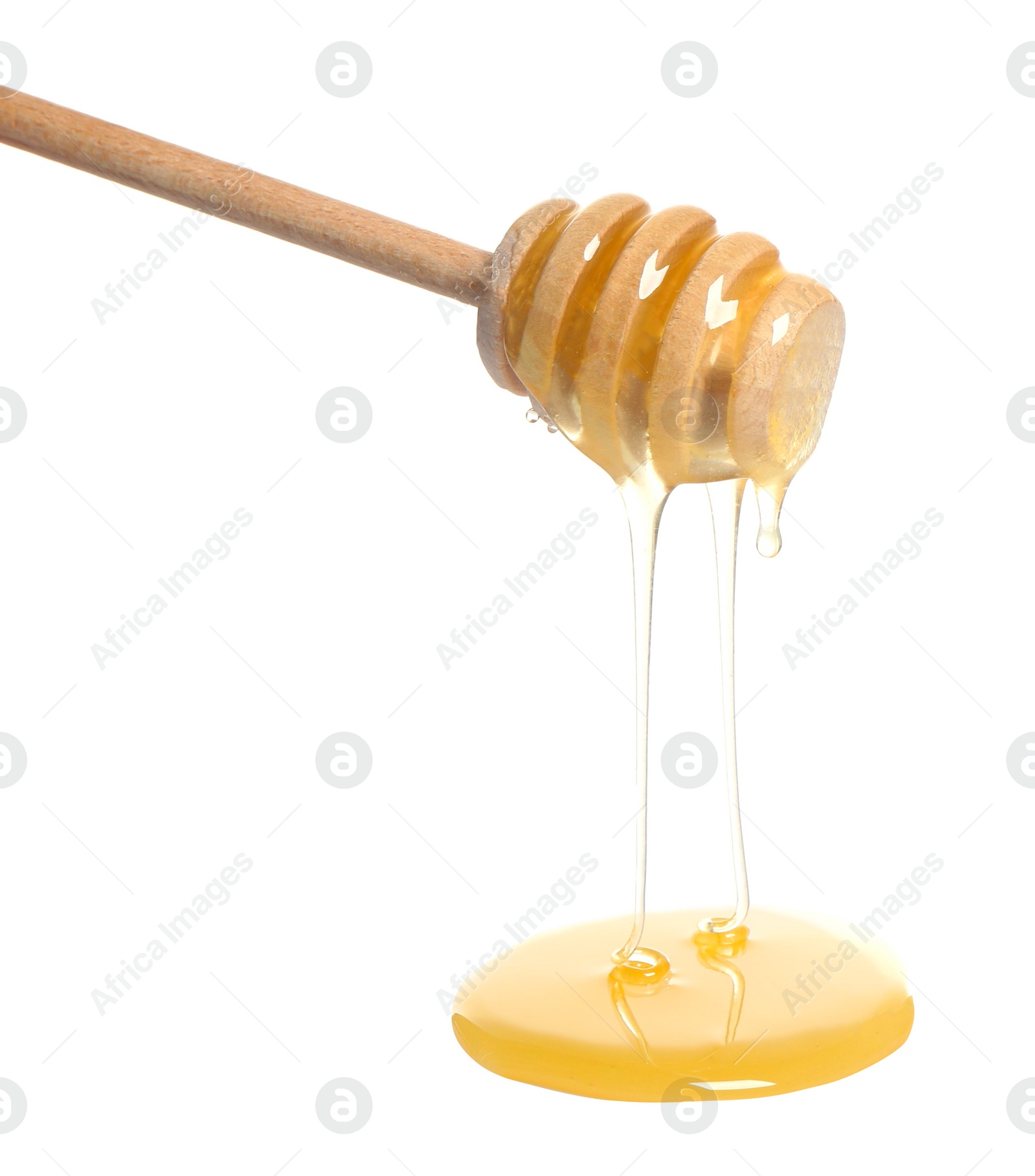 Photo of Natural honey dripping from dipper on white background