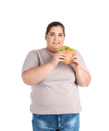 Overweight woman with hamburger on white background