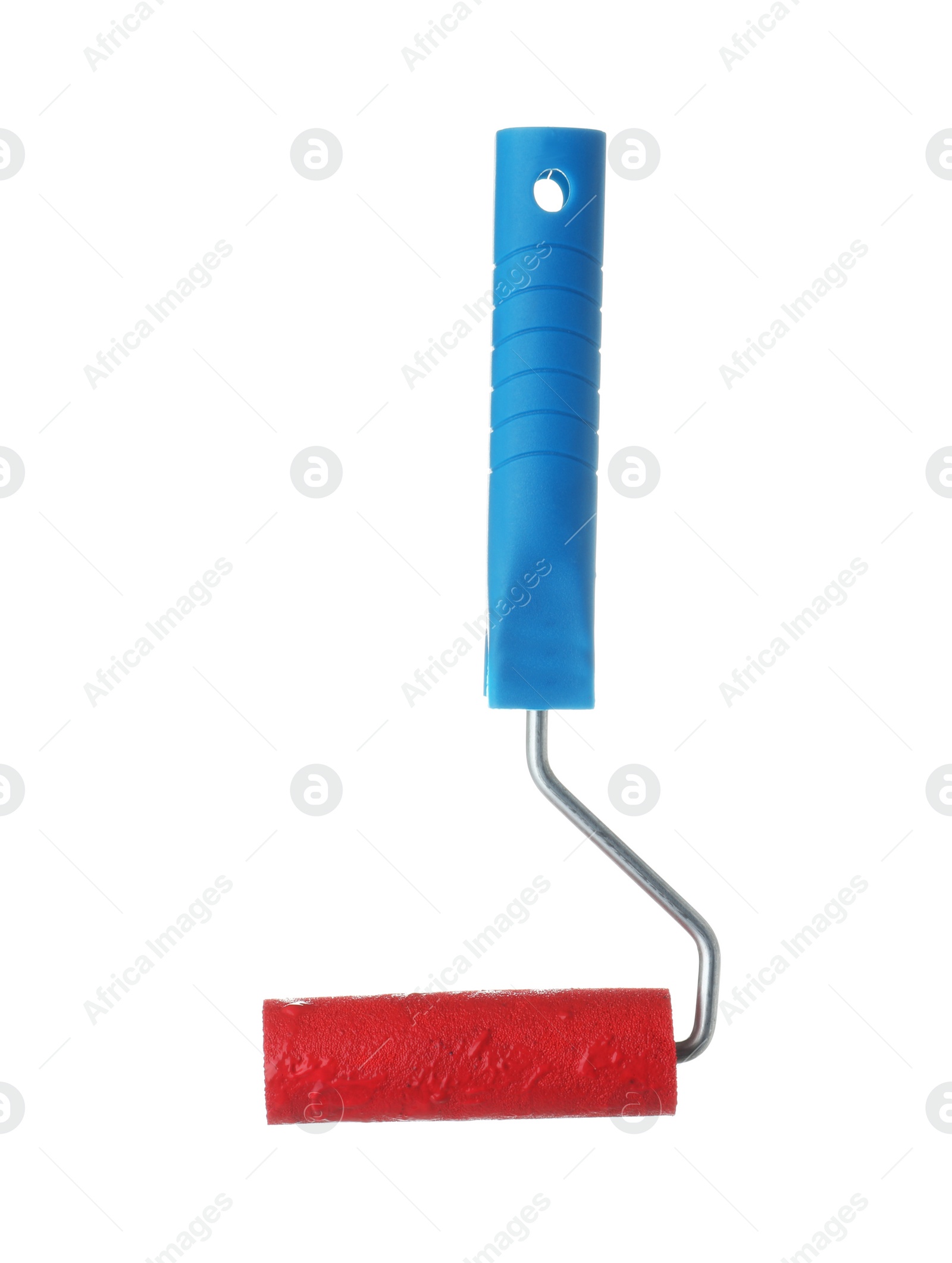 Photo of Roller brush with red paint on white background