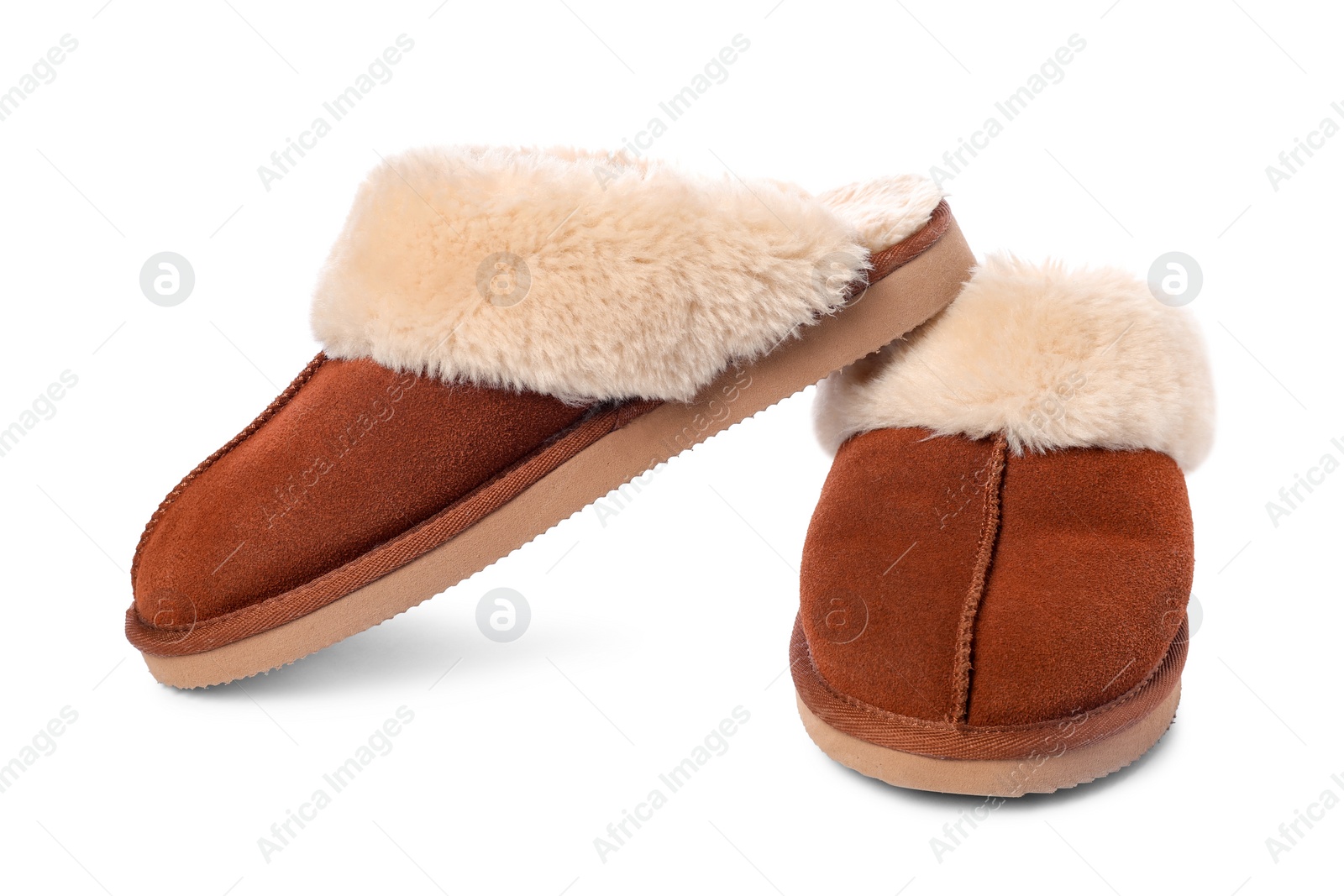 Photo of Pair of soft slippers with fur isolated on white