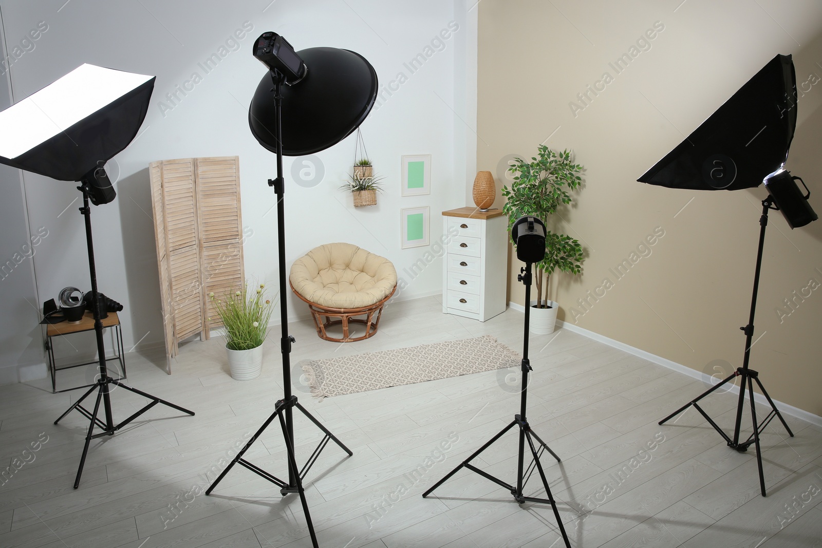 Photo of Example of living room interior design and professional equipment in photo studio