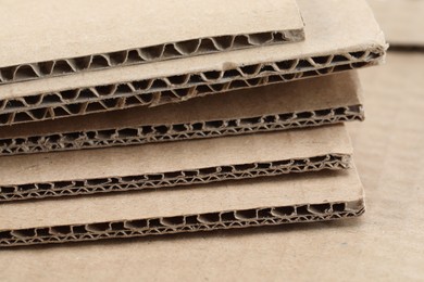 Photo of Sheets of brown corrugated cardboard, closeup view