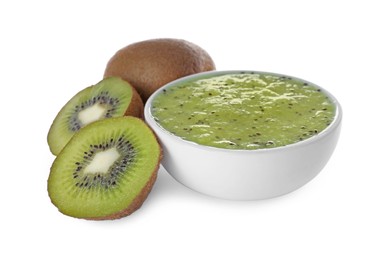 Photo of Kiwi puree in bowl and fresh fruits on white background