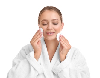 Photo of Beautiful young woman with cotton pads on white background