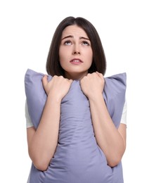 Photo of Unhappy young woman with pillow on white background. Insomnia problem