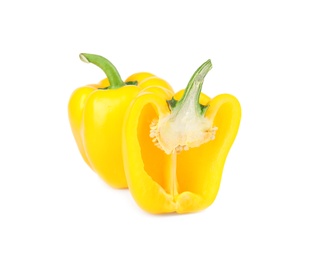 Photo of Whole and cut yellow bell peppers isolated on white