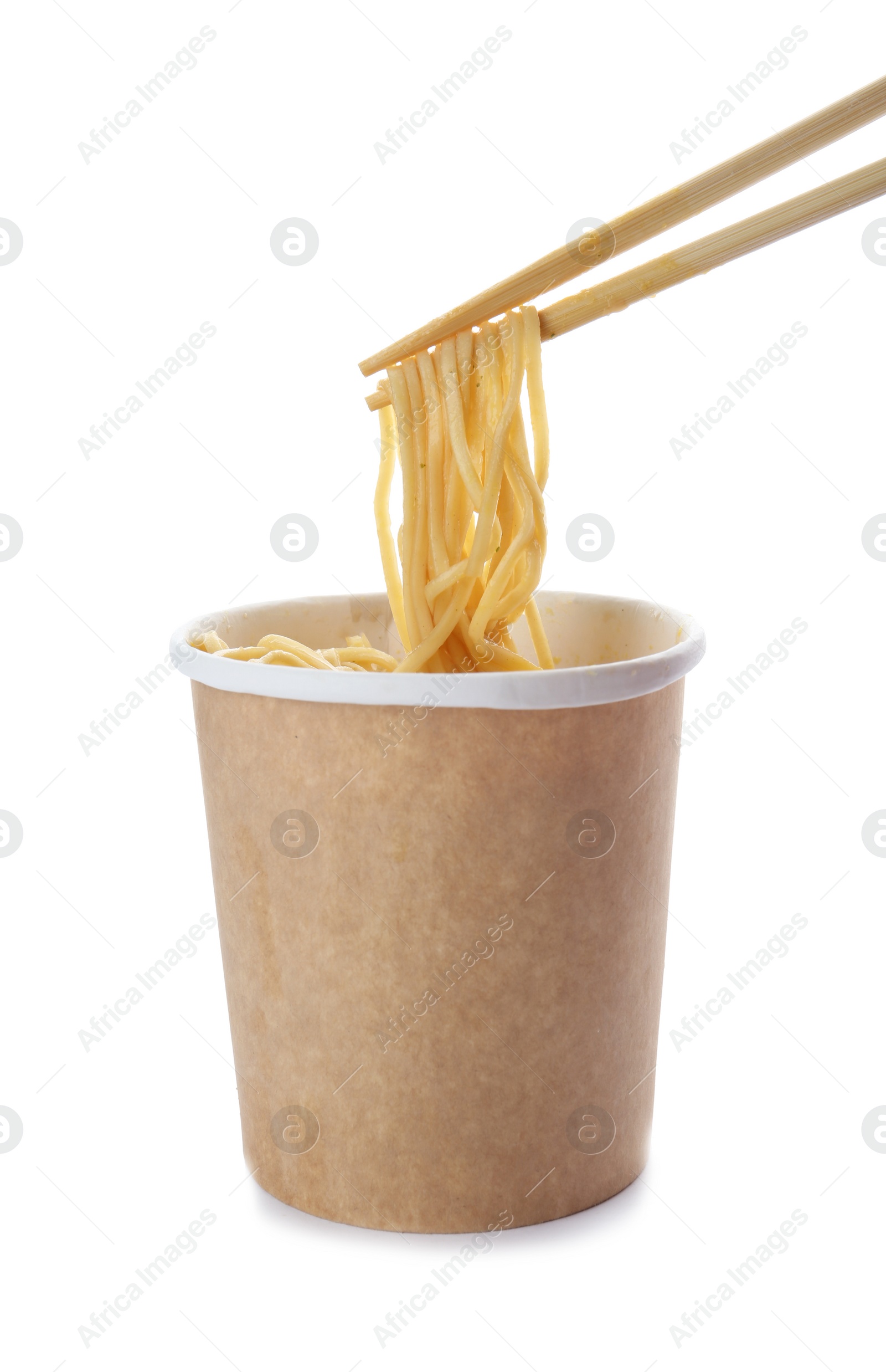 Photo of Paper cup of instant noodles and chopsticks isolated on white. Mockup for design