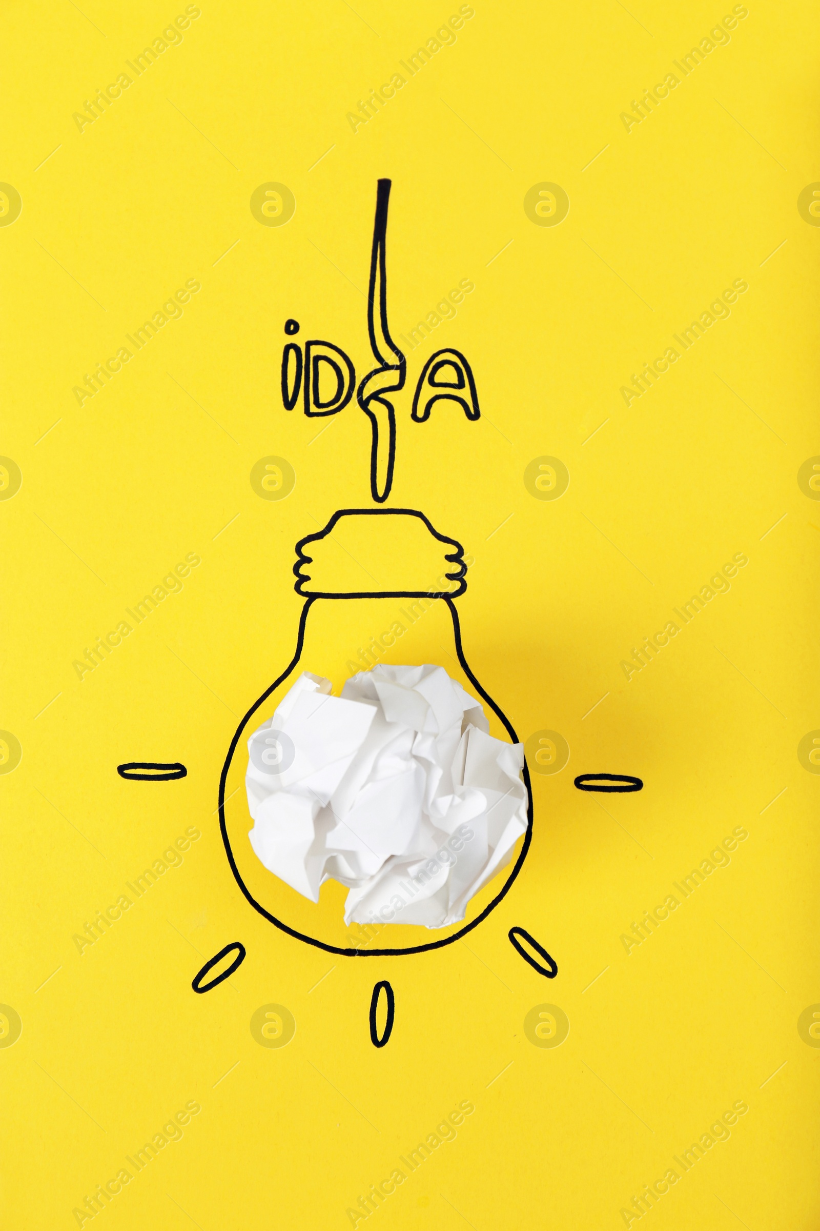 Photo of Composition with crumpled paper ball, drawing of lamp bulb and word IDEA on color background. Creative concept