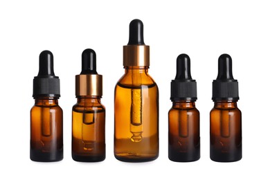 Image of Serums in different bottles isolated on white, collection