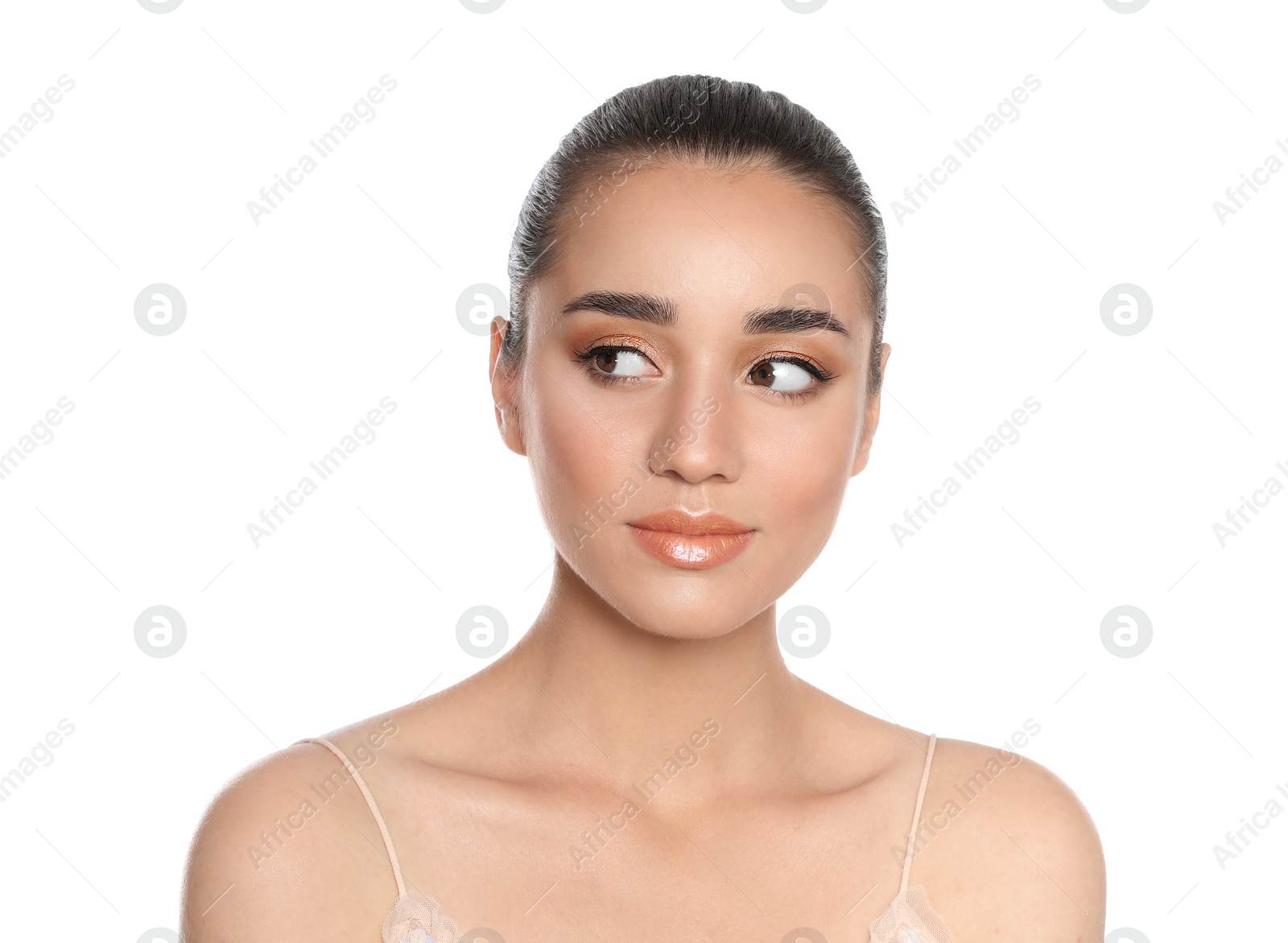 Photo of Beautiful young woman with glitter makeup on white background