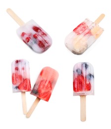 Tasty berry ice popsicles on white background