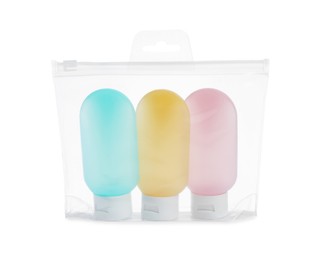 Cosmetic travel kit in plastic bag isolated on white. Bath accessories