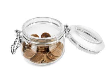 Glass jar with coins isolated on white