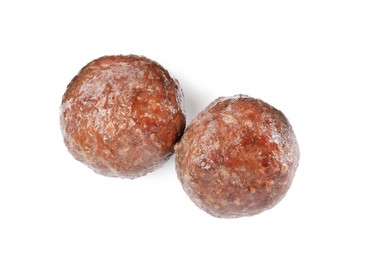 Photo of Tasty cooked meatballs on white background, top view