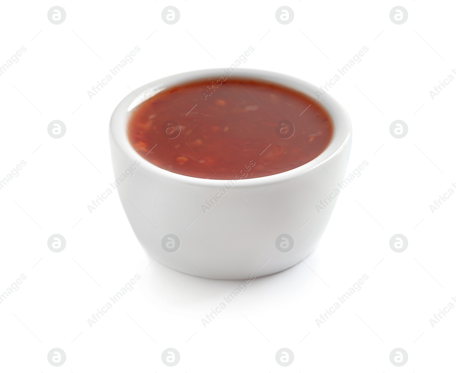 Photo of Delicious tomato sauce in bowl on white background