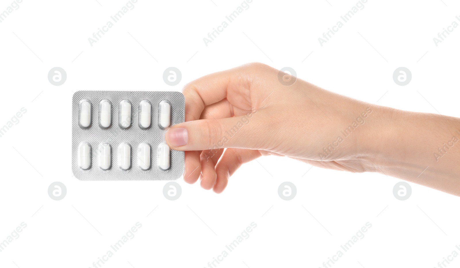 Photo of Woman holding pills in blister pack on white background, closeup