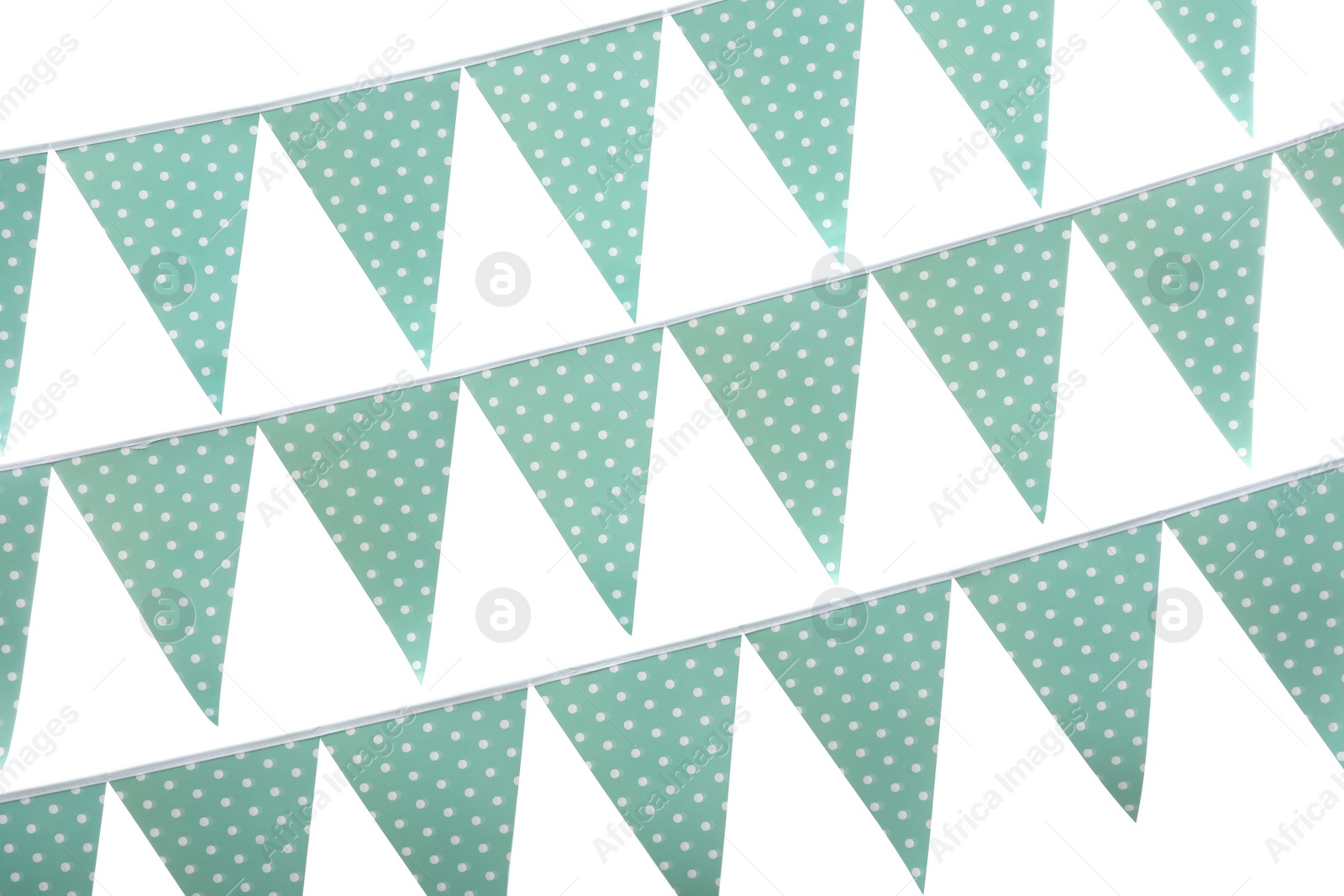 Photo of Rows of triangular bunting flags on white background. Festive decor