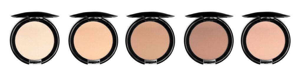Image of Compact face powders of different shades isolated on white, collection. Top view