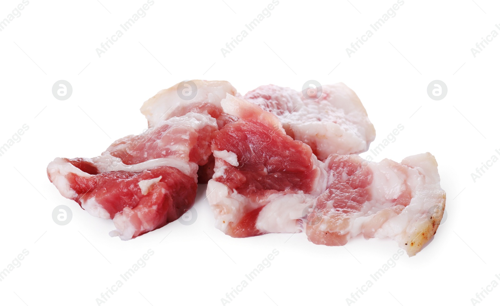 Photo of Pieces of tasty pork fatback on white background