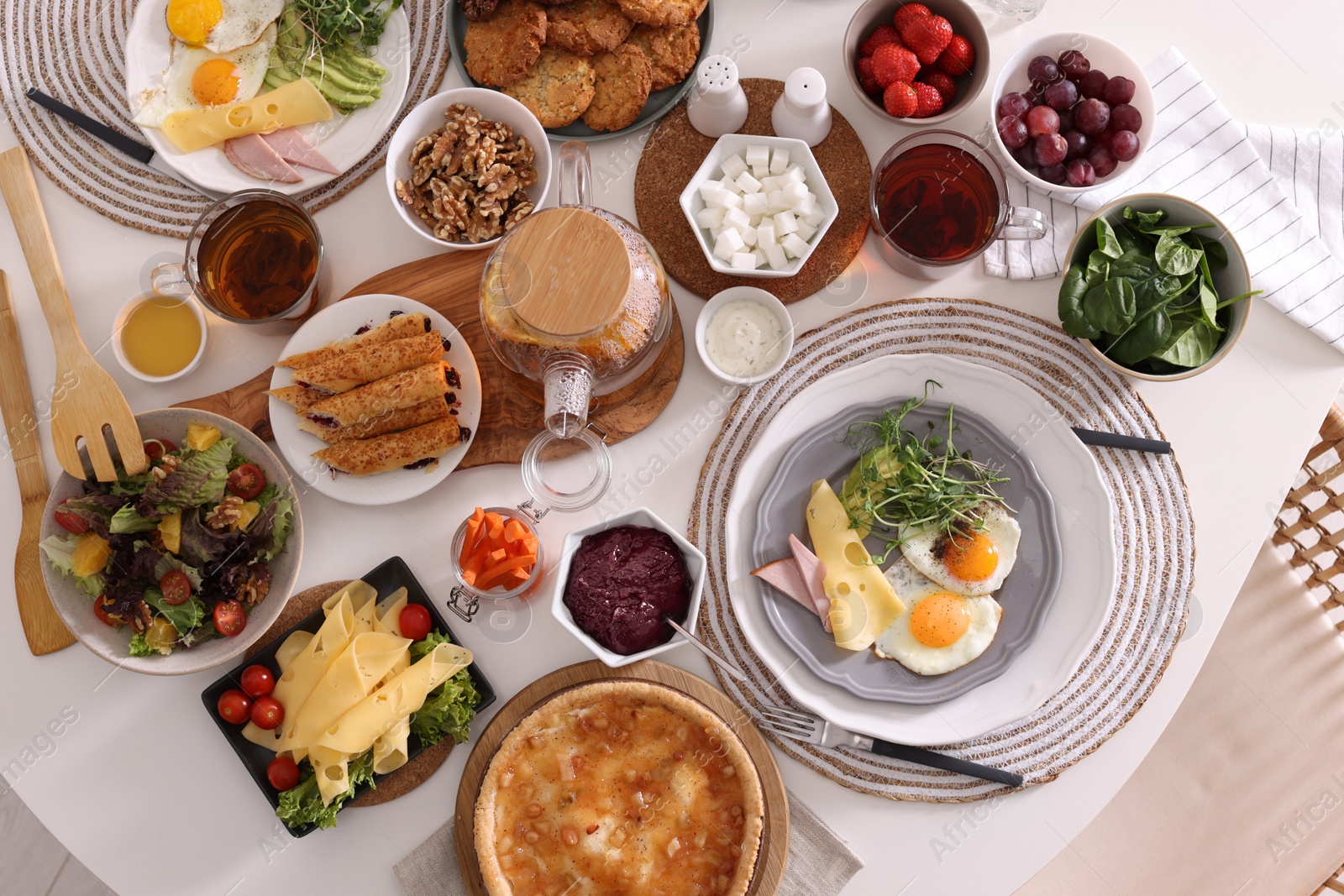 Photo of Many different dishes served on buffet table for brunch, flat lay