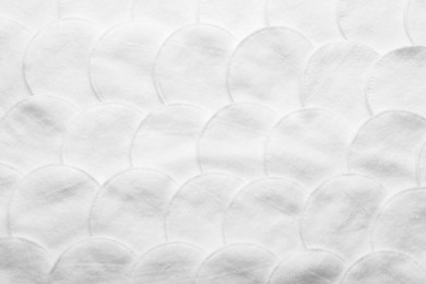 Photo of Soft clean white cotton pads as background, top view