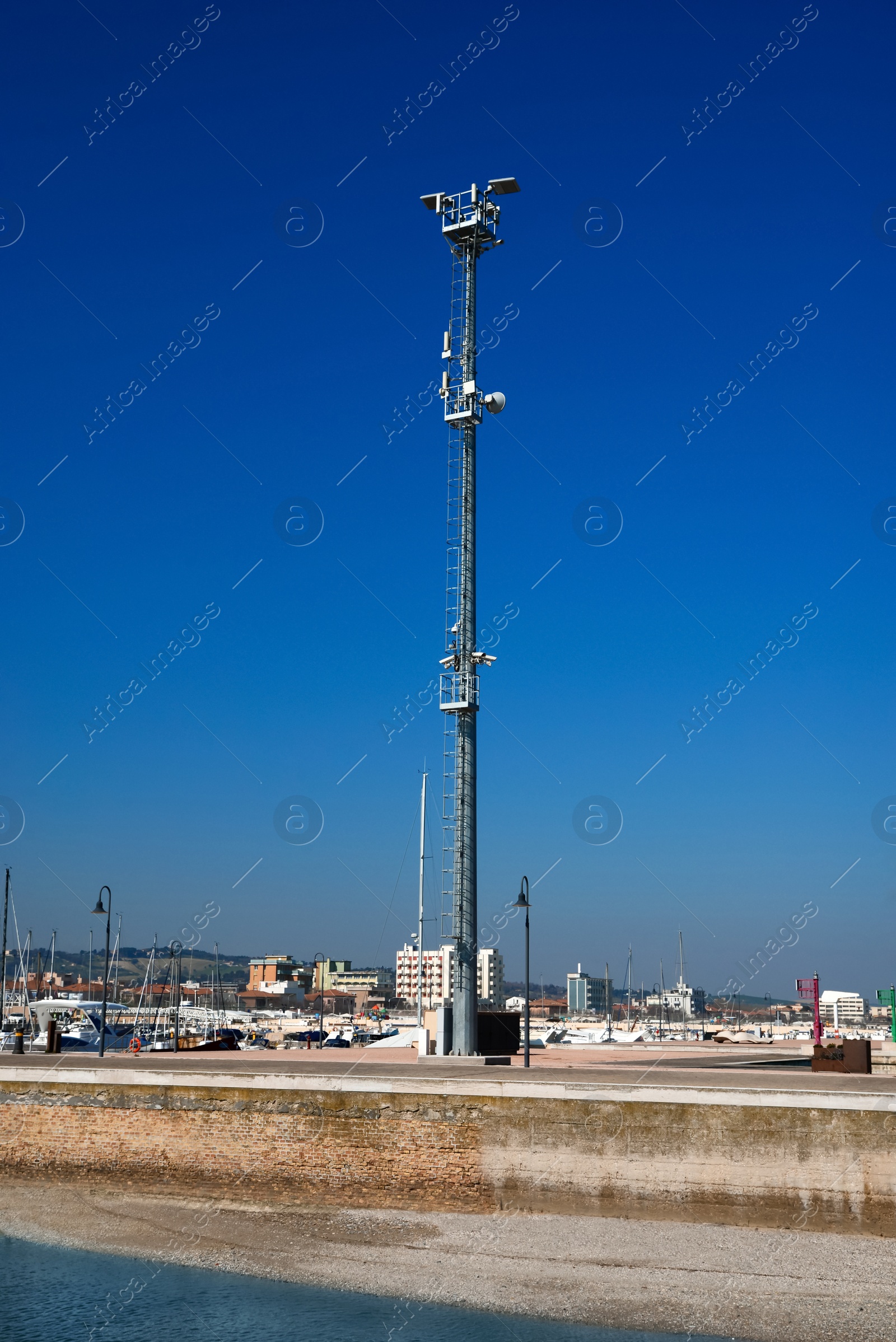 Photo of Light mast with CCTV and cellular communication system on pier