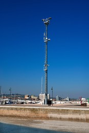Photo of Light mast with CCTV and cellular communication system on pier