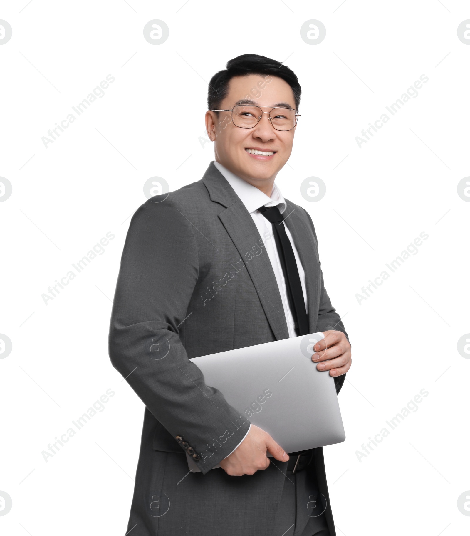 Photo of Businessman in suit with laptop posing on white background