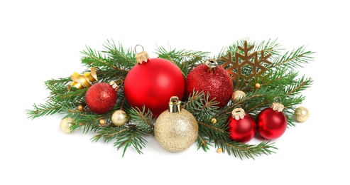 Photo of Christmas tree branches and festive decoration on white background